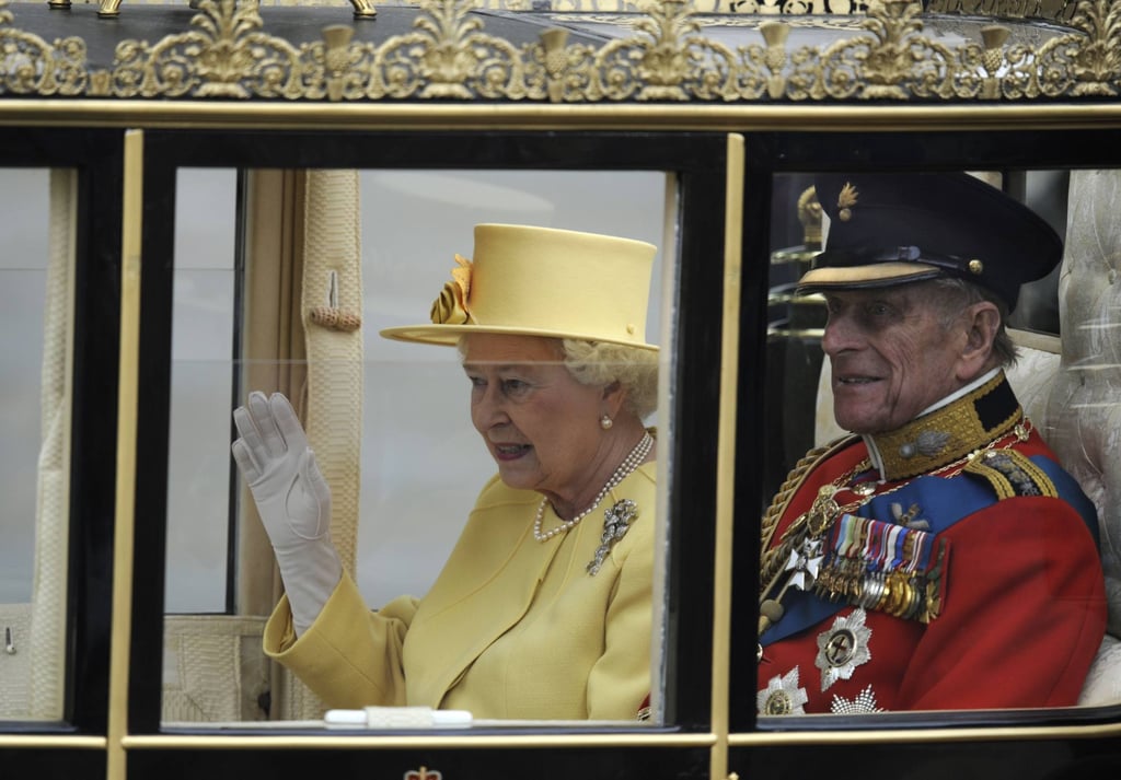 Britain’s Queen Elizabeth and Prince Philip, Duke of Edinburgh, travel to Buckingham Palace in London after the wedding for Prince William and Kate, Duchess of Cambridge, in April 2011. Photo: AFP Photo