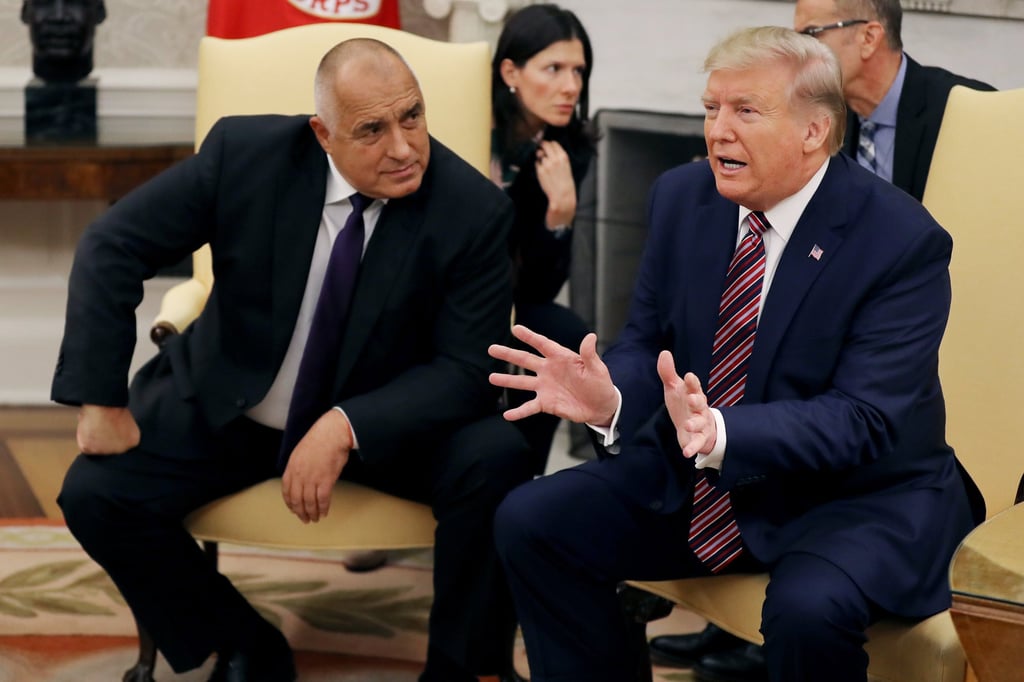 Former US President Donald Trump and former Bulgarian Prime Minister Boyko Borisov talk to members of the media in the Oval Office at the White House in November 2019. Photo: Getty Images
