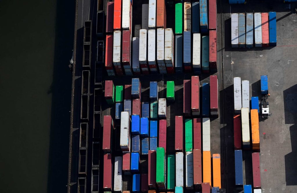 Containers are parked at the harbour of Duisburg, western Germany, on May 8, 2020. German exports were down 9.3 per cent last year but they soared past pre-pandemic levels in June for the first time since the coronavirus crisis wreaked havoc on trade. Photo: AFP Containers are parked at the harbour of Duisburg, western Germany, on May 8, 2020. German exports were down 9.3 per cent last year but they soared past pre-pandemic levels in June for the first time since the coronavirus crisis wreaked havoc on trade. Photo: AFP