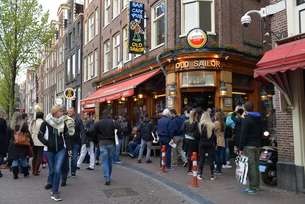 A crowd of people outside a pub in Amsterdam in 2017. Photo: Getty Images