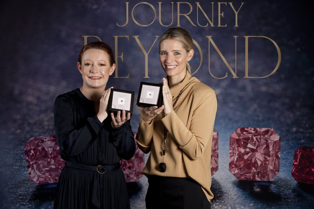 From left, Sinead Kaufman, chief executive, and Michelle Sherring, manager, sales and business development, of Rio Tinto Diamonds, holding a piece of history: stones from the 2021 Argyle Pink Diamonds Tender.