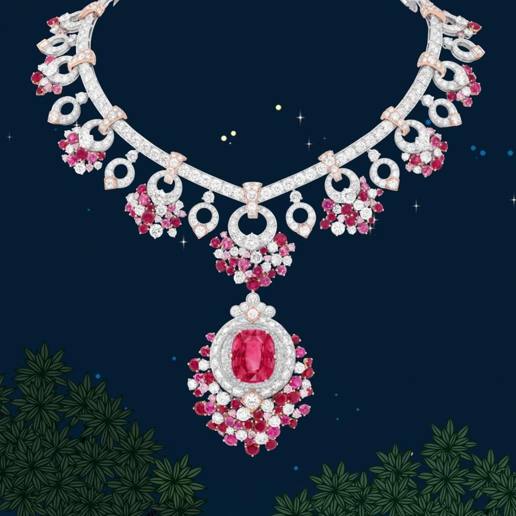 Jardin de Rubis necklace with detachable clip in white and rose gold, with one cushion-cut ruby of 18.12 carats from Tanzania, as well as rubies and pink and white diamonds. Jardin de Rubis necklace with detachable clip in white and rose gold, with one cushion-cut ruby of 18.12 carats from Tanzania, as well as rubies and pink and white diamonds.