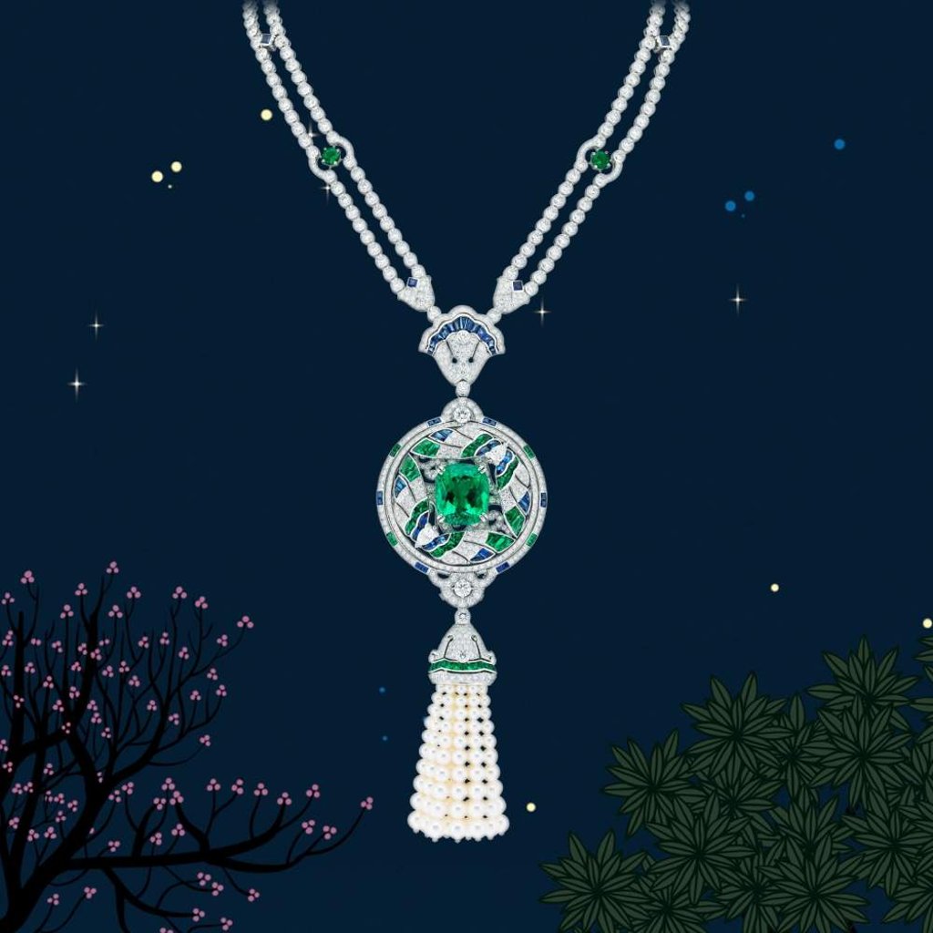 Secret des Papillons necklace with detachable clip in white gold, with one cushion-cut emerald of 16.52 carats from Colombia, plus sapphires, emeralds, white cultured pearls and diamonds. Secret des Papillons necklace with detachable clip in white gold, with one cushion-cut emerald of 16.52 carats from Colombia, plus sapphires, emeralds, white cultured pearls and diamonds.