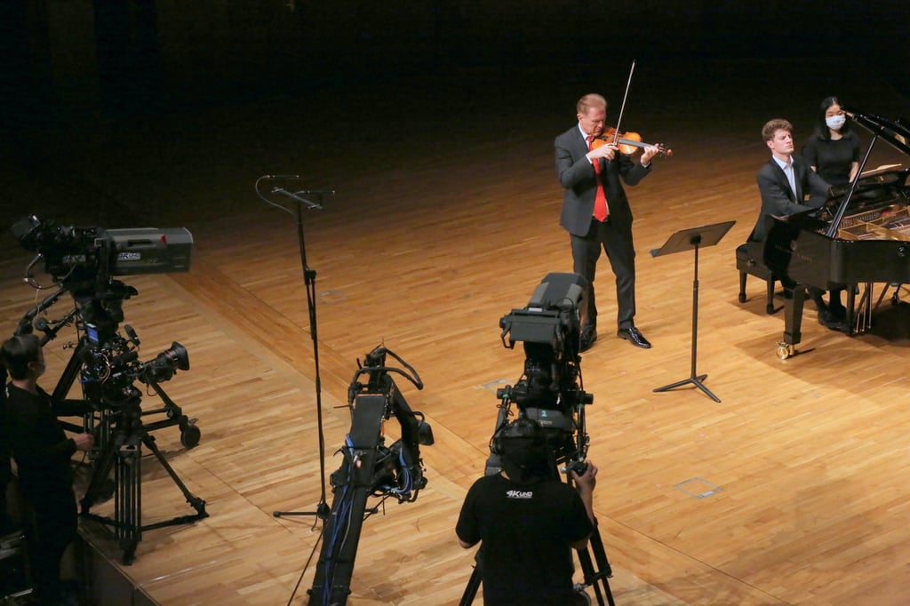 A rare performance by conductor Christoph Poppen on the violin, with pianist Alexander Krichel, filmed as part of the Hong Kong Sinfonietta concert film Back on Stage II (Quarantined!). Photo: HK Sinfonietta Ltd