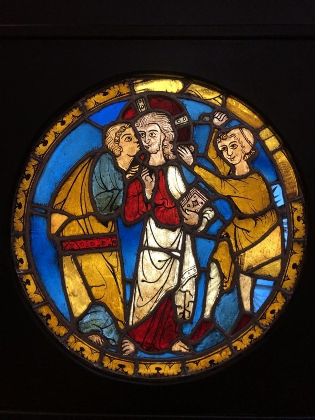 The Kiss of Judas, Anonymous. Stained glass from Maihingen, Germany, around 1300. Part of the McCarthy Collection.