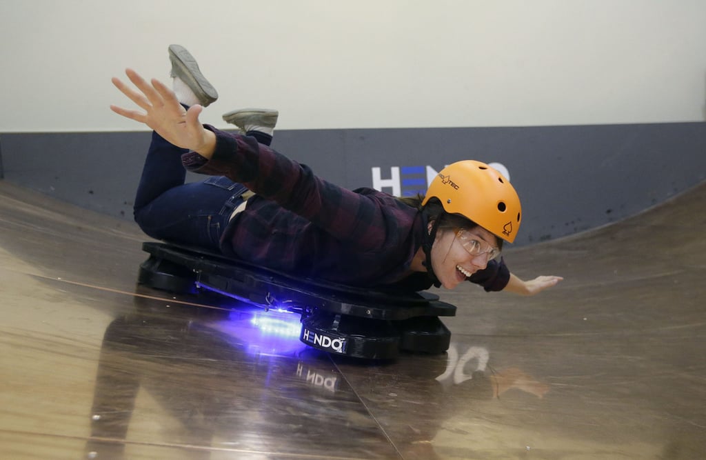 An engineer rides a real-life Hendo Hoverboard in Los Gatos, California. Photo: AP An engineer rides a real-life Hendo Hoverboard in Los Gatos, California. Photo: AP