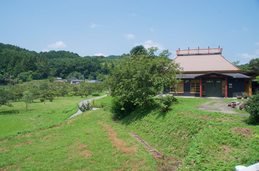 Walk Japan runs its local operations and its Community Project from what was an abandoned farmhouse (right) next to land it now manages. Photo: Peter Neville-Hadley Walk Japan runs its local operations and its Community Project from what was an abandoned farmhouse (right) next to land it now manages. Photo: Peter Neville-Hadley