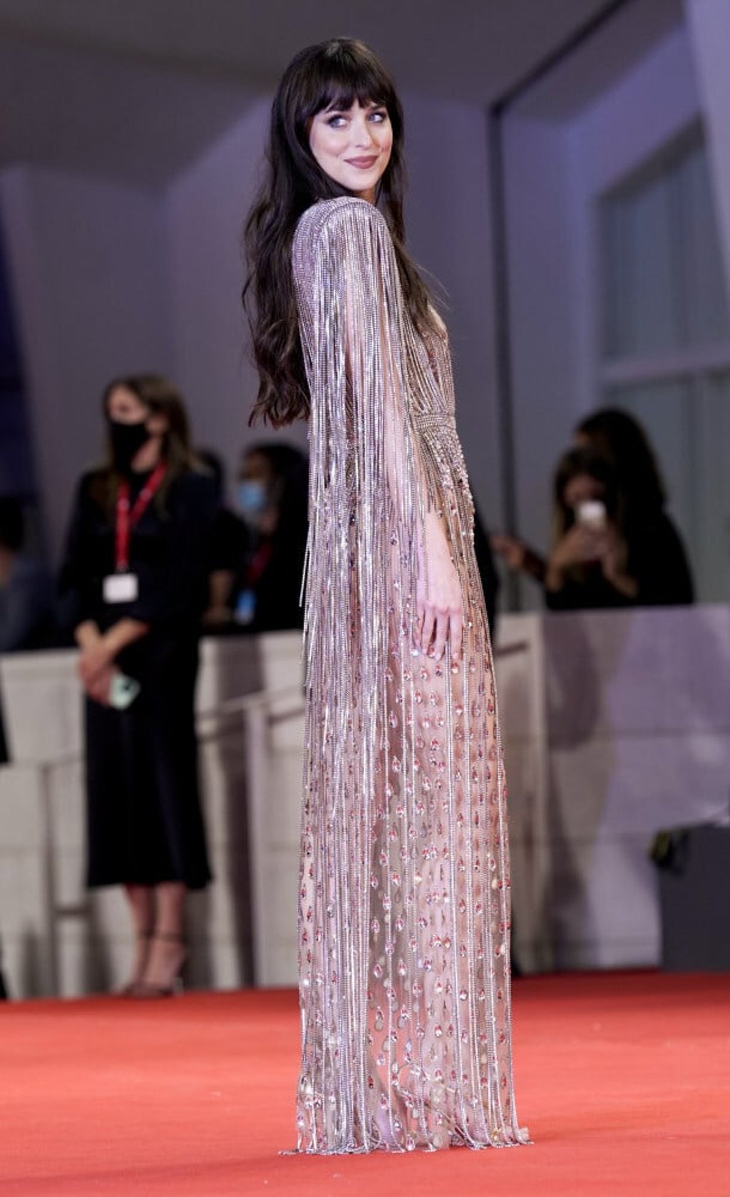 Dakota Johnson poses at the premiere of the film The Lost Daughter during the 78th edition of the Venice Film Festival in on September 3. Photo: AP Photo