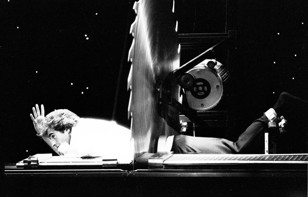 Copperfield performs his “Death Saw” magic trick at the Hong Kong Coliseum, in September, 1988. Photo: SCMP