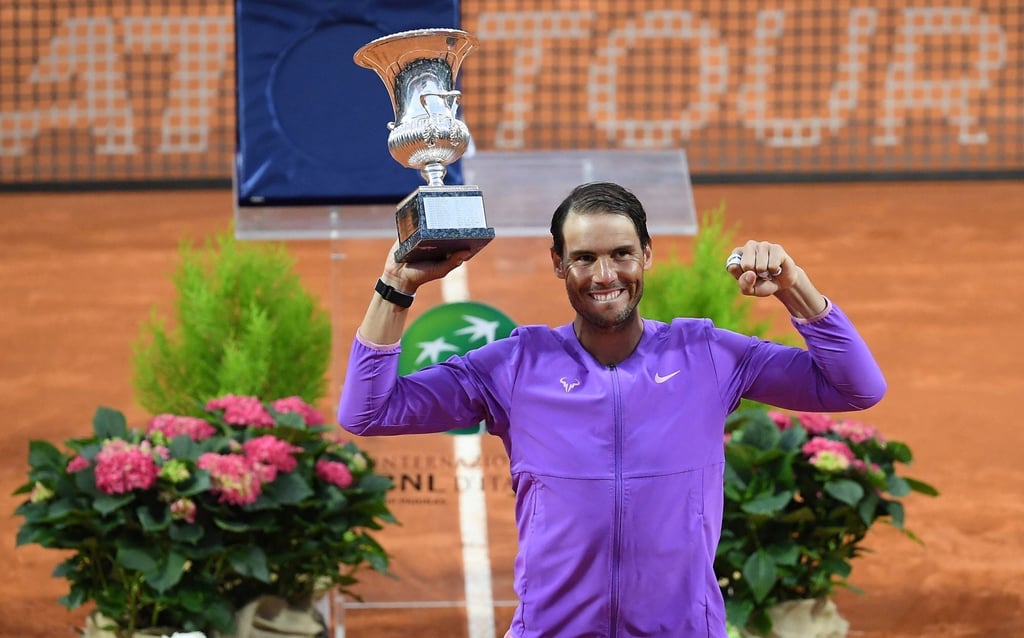 Rafael Nadal poses with his trophy after winning his men’s singles final against Novak Djokovic of Serbia at the Italian Open tennis tournament in Rome, Italy, on May 16. Photo: EPA-EFE Rafael Nadal poses with his trophy after winning his men’s singles final against Novak Djokovic of Serbia at the Italian Open tennis tournament in Rome, Italy, on May 16. Photo: EPA-EFE