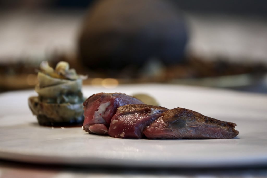 Pigeon under ash with artichoke and fig sauce from Estro. Photo: Jonathan Wong