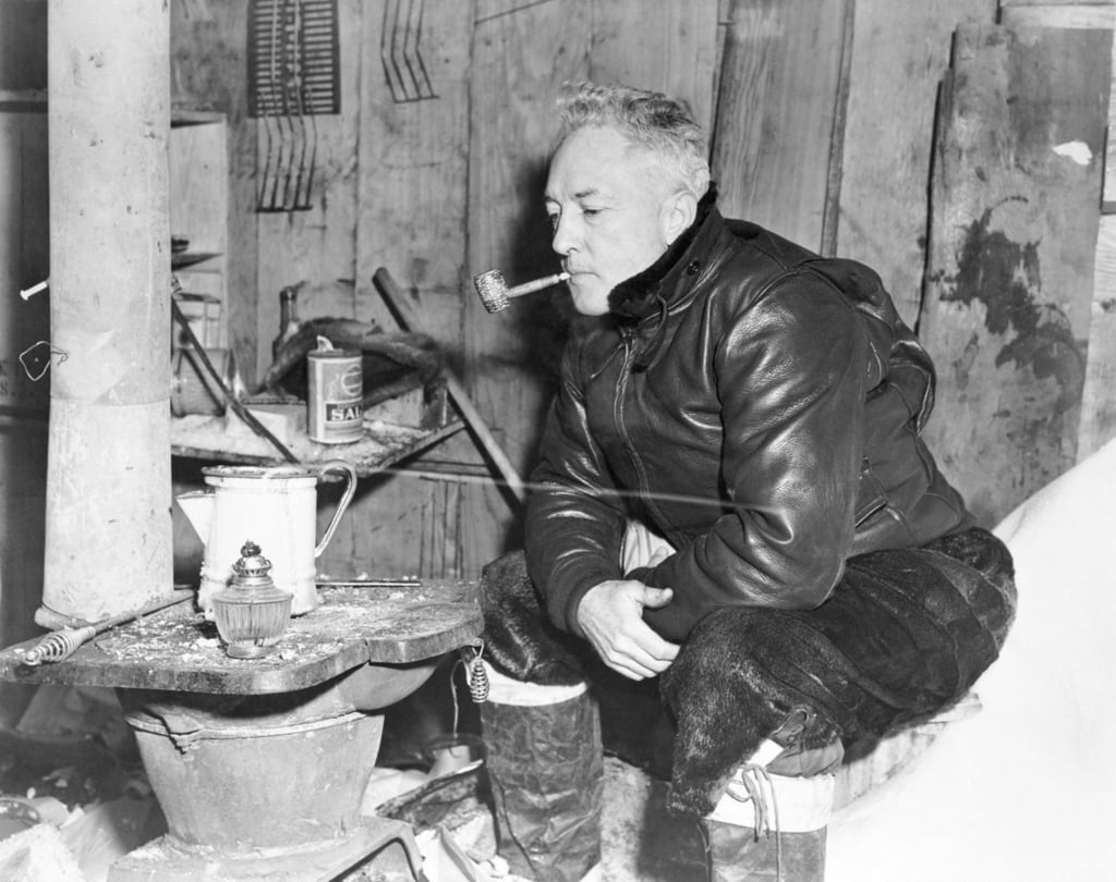 American explorer Rear Admiral R.E. Byrd smokes tobacco left behind from an expedition 12 years earlier at his hut on the Ross Ice Shelf in Antarctica. Tobacco smoking has reached every corner of the world. Photo: Bettmann/Corbis/Bettmann Archive American explorer Rear Admiral R.E. Byrd smokes tobacco left behind from an expedition 12 years earlier at his hut on the Ross Ice Shelf in Antarctica. Tobacco smoking has reached every corner of the world. Photo: Bettmann/Corbis/Bettmann Archive