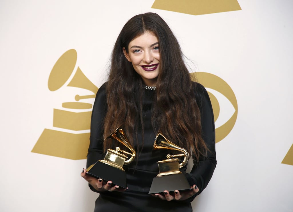Pop Singer Lorde poses backstage with her awards for song of the year and best pop solo performance, both for Royals, at the 56th annual Grammy Awards. Photo: Reuters