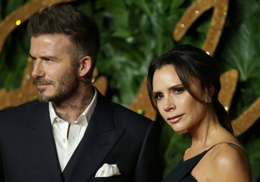 David Beckham and his wife fashion designer Victoria Beckham pose on the red carpet at the British Fashion Awards 2018. Photo: AFP
