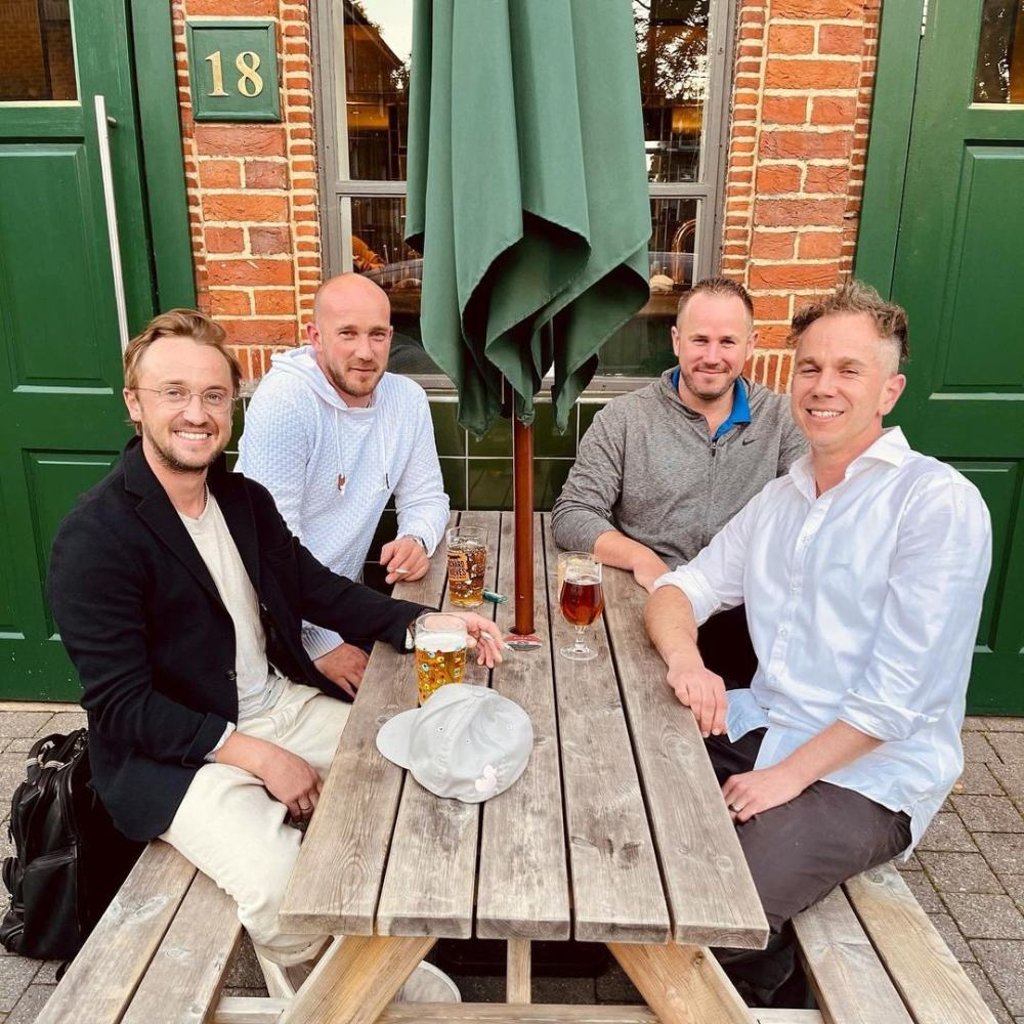 Tom Felton out with his three older brothers. Photo: @ItaT22Squad/Twitter Tom Felton out with his three older brothers. Photo: @ItaT22Squad/Twitter