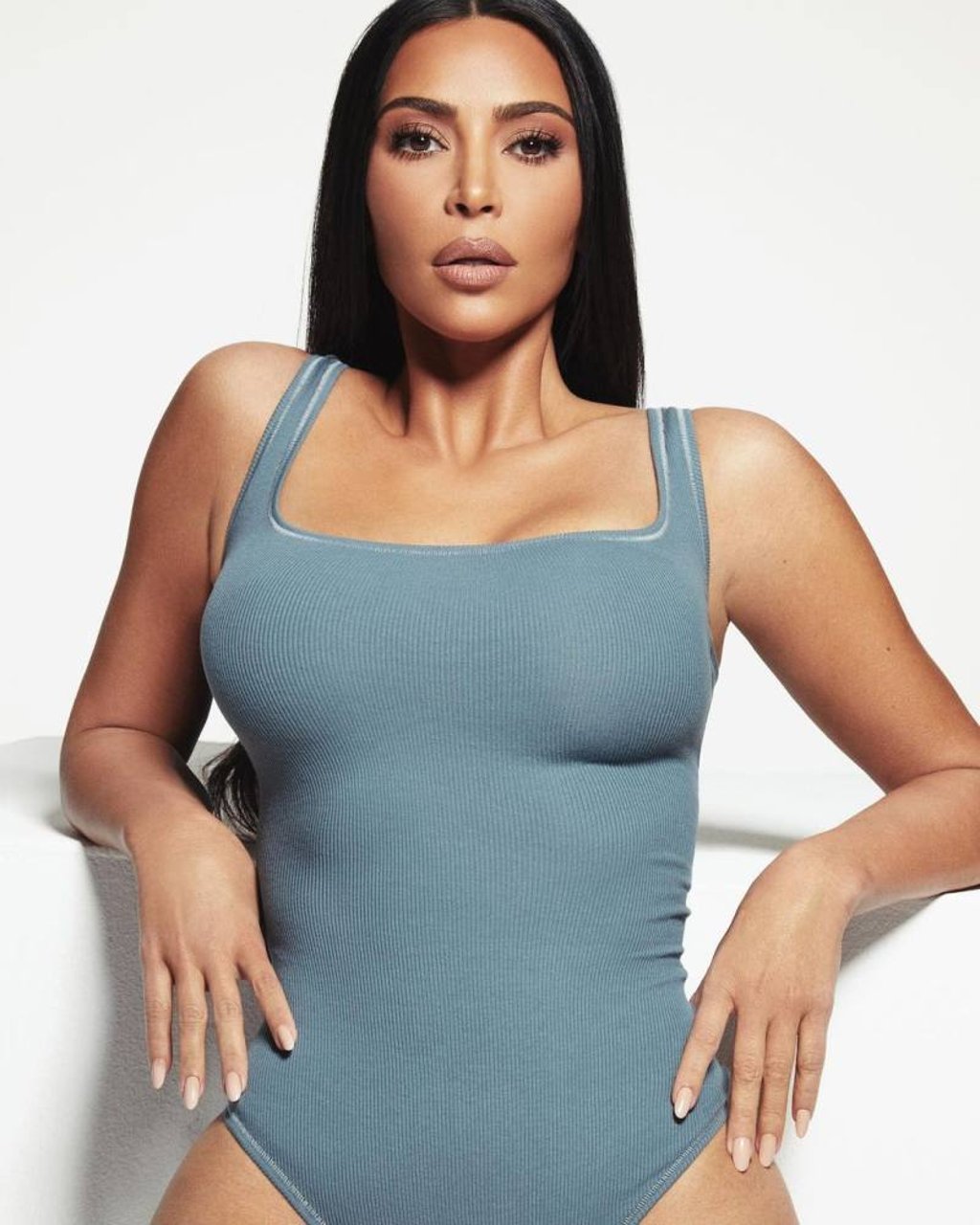 Kim Kardashian in Skims’ cotton rib bodysuit in kyanite. Photo: @skims/Instagram