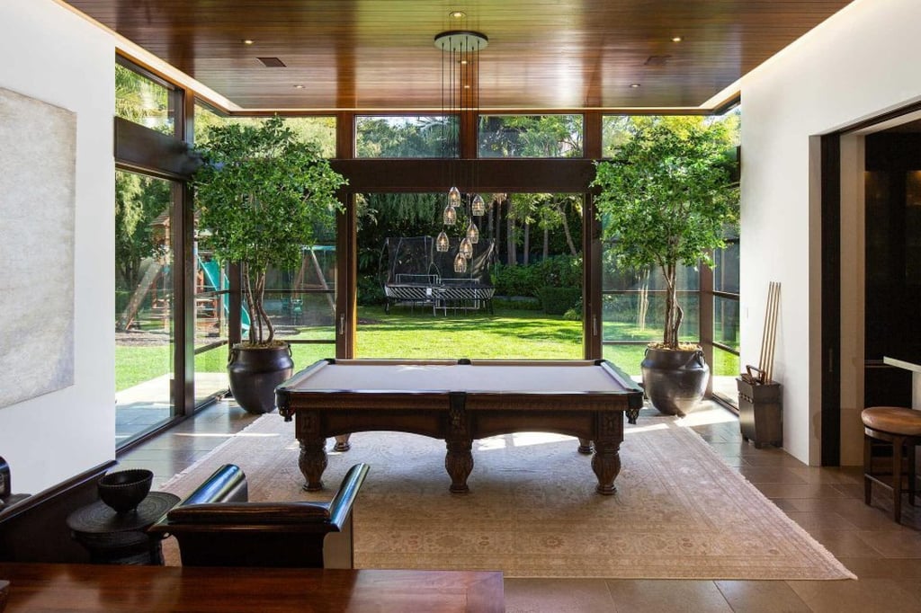 Matt Damon’s mansion features an outdoor children’s play area … and a snooker table for the adults. Photo: TopTenRealEstateDeals