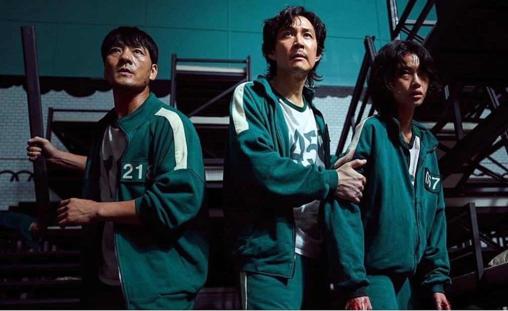 (From left) Park Hae – soo, Lee and Jung Ho-yeon in a scene from Squid Game. Photo: Netflix