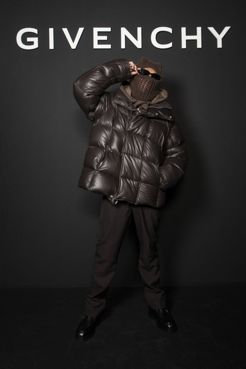 Tyga poses for photographers before the Givenchy’s spring/summer 2022 ready-to-wear fashion show presented in Paris, on October 3. Photo: Invision/AP