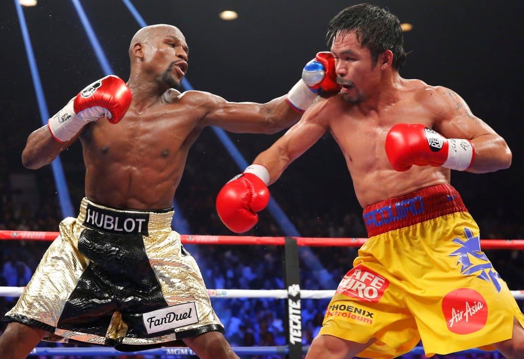 Floyd Mayweather, Jnr of the US lands a left to the face of Manny Pacquiao of the Philippines during their welterweight WBO, WBC and WBA (Super) title fight in Las Vegas, Nevada, in May 2015. Photo: Reuters