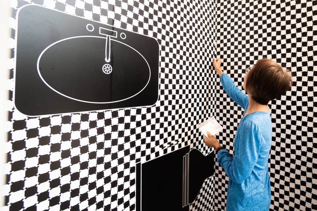 Among the exhibits at OK Dementia is a disconcerting chequerboard bathroom installation. Photo: Enable Foundation Among the exhibits at OK Dementia is a disconcerting chequerboard bathroom installation. Photo: Enable Foundation