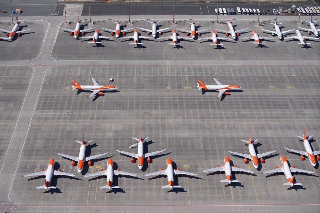 EasyJet and Lufthansa planes that have been temporarily pulled out of service at Berlin-Brandenburg Airport in Germany. Photo: Getty Images EasyJet and Lufthansa planes that have been temporarily pulled out of service at Berlin-Brandenburg Airport in Germany. Photo: Getty Images