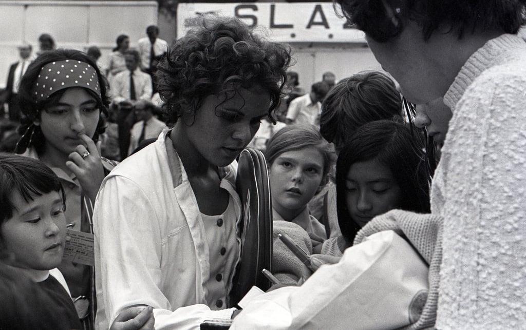 Goolagong signs autographs for supporters during the Hong Kong tournament. Photo: SCMP Goolagong signs autographs for supporters during the Hong Kong tournament. Photo: SCMP