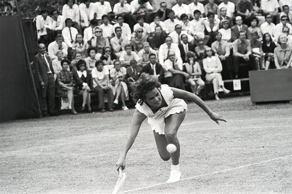 Goolagong gets down to a low ball during a match at the Hong Kong national championships in October 1971. Photo: SCMP Goolagong gets down to a low ball during a match at the Hong Kong national championships in October 1971. Photo: SCMP