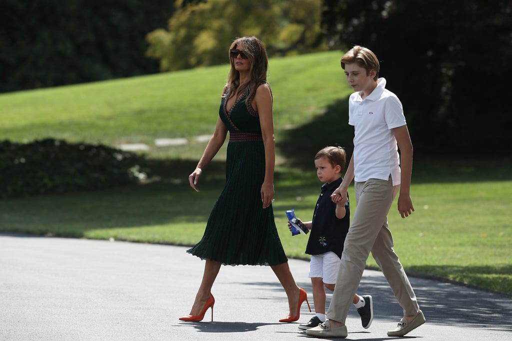 Melania Trump walks with son Barron and grandson Joseph Frederick Kushner towards the Marine One on the South Lawn of the White House in 2017. Photo: Getty Images