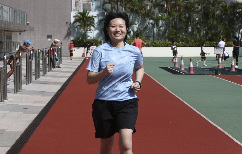 Breast cancer survivor Chan goes for a jog at Tsing Yi Sports Ground in the New Territories. Photo: Jonathan Wong Breast cancer survivor Chan goes for a jog at Tsing Yi Sports Ground in the New Territories. Photo: Jonathan Wong