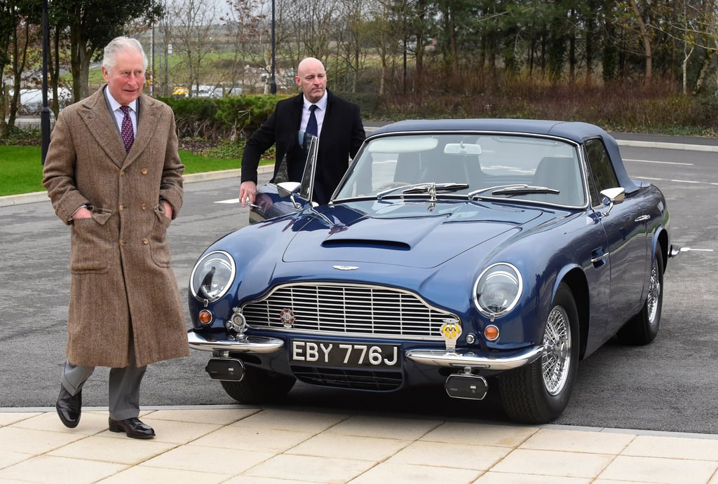 The heir to the British throne has made it known that his Aston Martin sports car now runs on wine and cheese. Photo: Rebecca Naden The heir to the British throne has made it known that his Aston Martin sports car now runs on wine and cheese. Photo: Rebecca Naden
