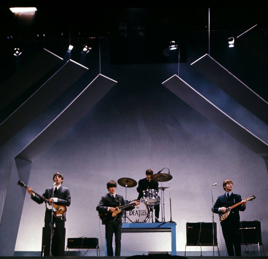 The Beatles: Paul McCartney (bass), George Harrison (guitar), Ringo Starr (drums) and John Lennon (guitar) on stage during a concert in London. Photo: C.Press/AFP