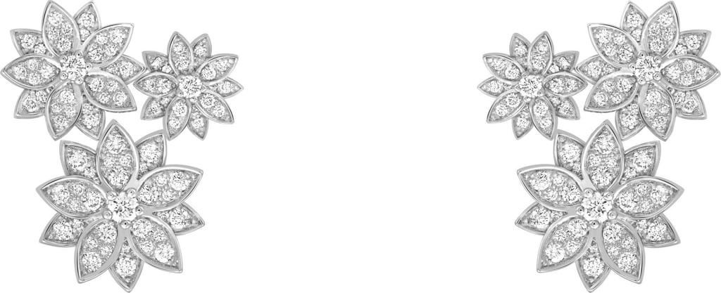 The three flowers Lotus earrings in white gold and diamonds.
