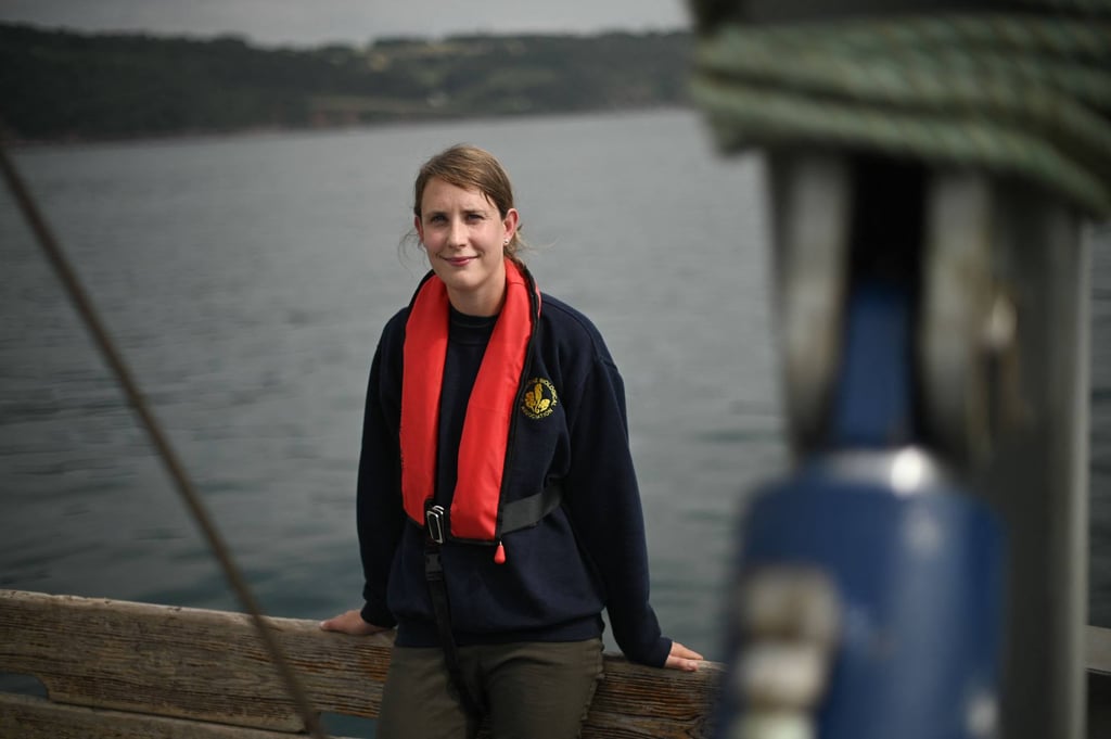 Clare Ostle on the MBA Sepia research vessel, off the coast of Plymouth, UK. Photo: Daniel Leal-Olivas/AFP