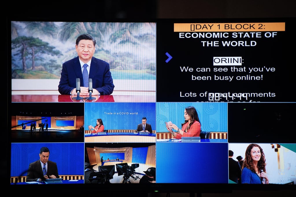 A handout photo made available by Apec New Zealand, the host of the Apec forum this year, shows Chinese President Xi Jinping (top left) speaking on a screen via video link at the Apec CEO Summit in Wellington, New Zealand, on November 11. Photo: EPA-EFE