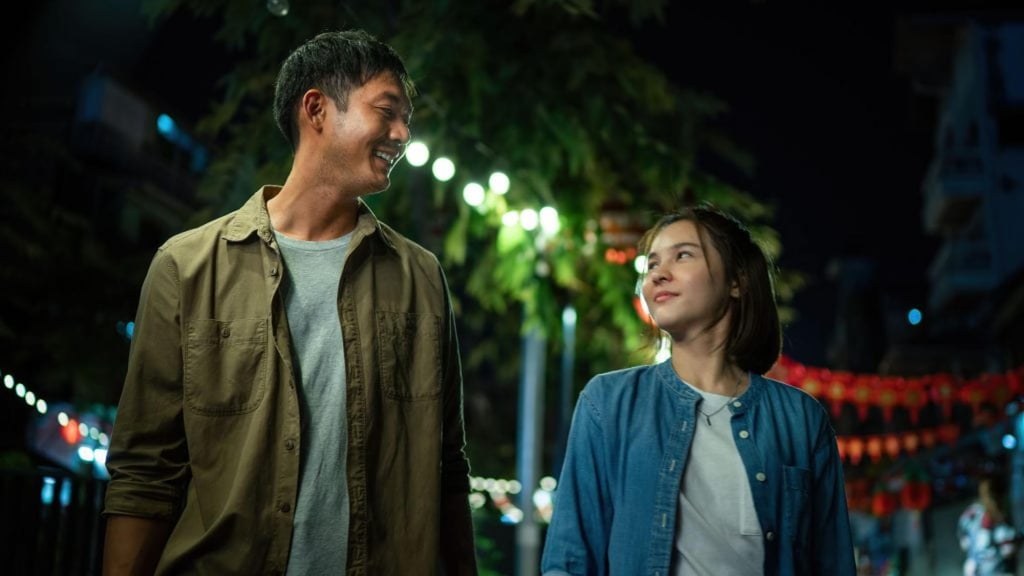 Sukollawat (left) and Sushar Manaying in a still from Bangkok Breaking. Photo: Netflix