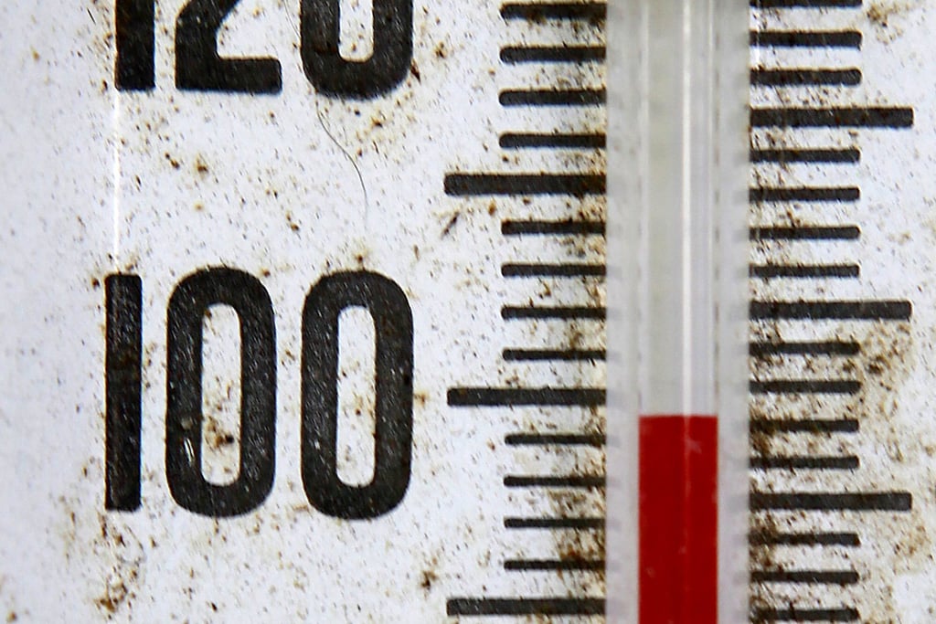 Climate change is a growing reality for many parts of the world, including the US northwest where this thermometer recorded what was then a near-record temperature of just below 100 degrees Fahrenheit in a north Seattle neighbourhood in 2009. Photo: AP Climate change is a growing reality for many parts of the world, including the US northwest where this thermometer recorded what was then a near-record temperature of just below 100 degrees Fahrenheit in a north Seattle neighbourhood in 2009. Photo: AP