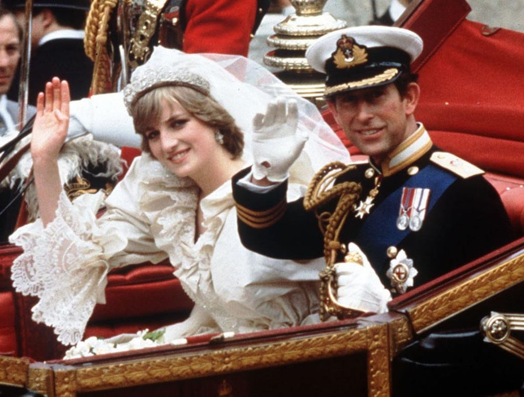 Princess Diana and Prince Charles wave from their carriage on their wedding day in 1981, in London. Photo: AP Photo/PA