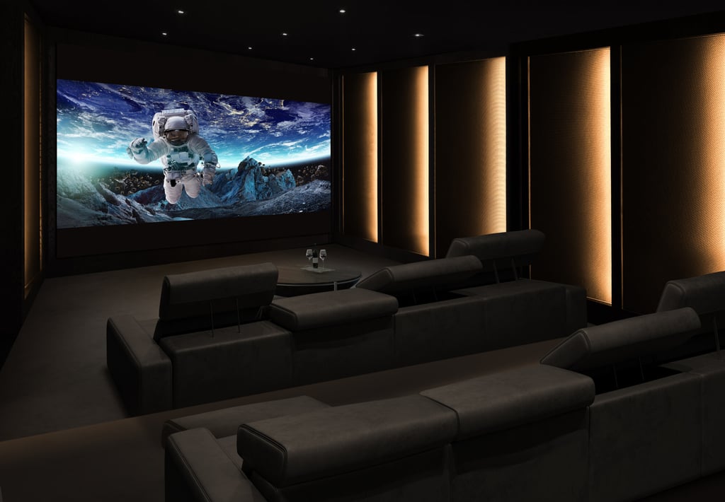 Home theatre, luxury interior, comfortable divan – and big screen. Photo: Handout