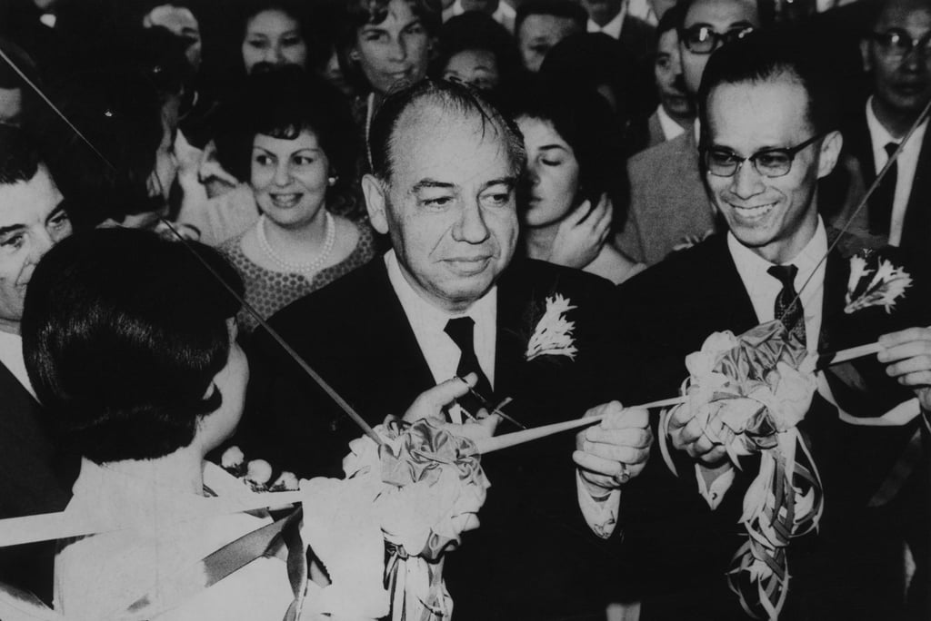 Nicholas Marsh (centre) cuts the ribbon to open the Cheung Kong Building in North Point, while Li Ka-shing (right) and his wife look on in a photo from 1964. Nicholas Marsh (centre) cuts the ribbon to open the Cheung Kong Building in North Point, while Li Ka-shing (right) and his wife look on in a photo from 1964.