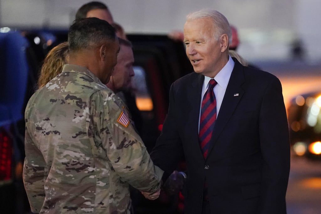 US President Joe Biden greets soldiers as he arrives at Fort Bragg on Air Force One on Monday to mark the coming Thanksgiving holiday. Photo: AP