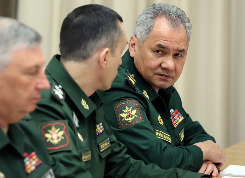 Russian Defence Minister Sergei Shoigu (right) waits before a meeting with Russian President Vladimir Putin at the Bocharov Ruchei state residence in Sochi, Russia on November 3. Photo: Sputnik via Reuters