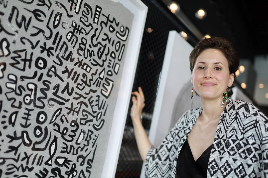 Boffo with one of her works at the HKI Gallery. Photo: Paul Wan