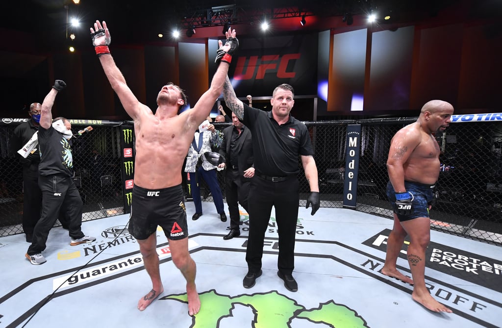 Stipe Miocic celebrates after his victory over Daniel Cormier in their UFC heavyweight title trilogy bout at UFC 252. Photo: Jeff Bottari/Zuffa LLC