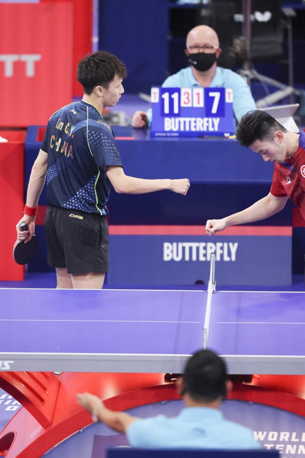 Hong Kong’s Wong Chun-ting congratulates Lin Gaoyuan of China. Photo: Thomas Shea/USA TODAY Sports
