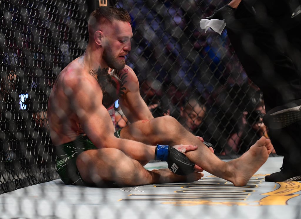 Conor McGregor holds his leg after suffering an injury against Dustin Poirier at UFC 264. Photo: Gary A Vasquez/USA TODAY Sports Conor McGregor holds his leg after suffering an injury against Dustin Poirier at UFC 264. Photo: Gary A Vasquez/USA TODAY Sports