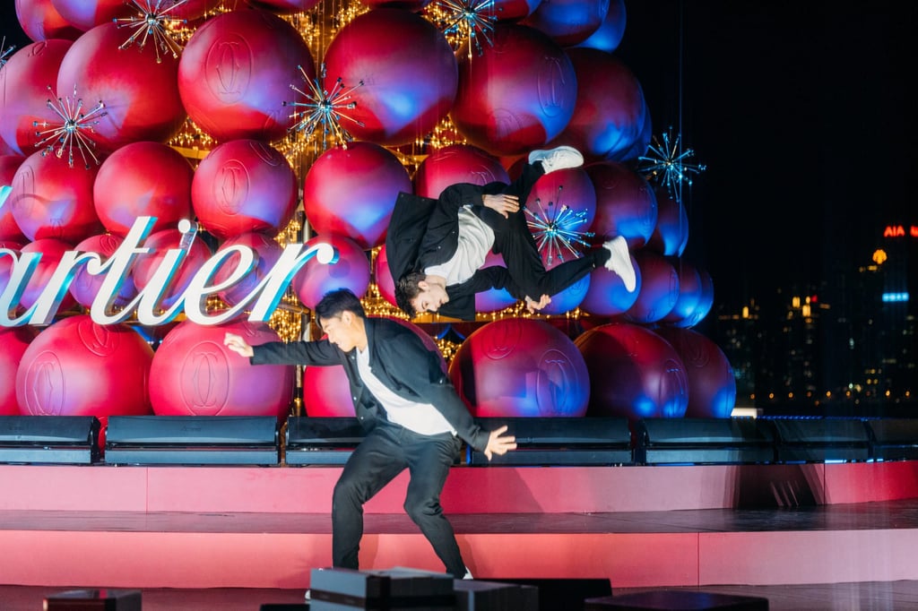 A parkour performance at the Cartier Christmas tree lighting ceremony at K11 Musea in Kowloon.