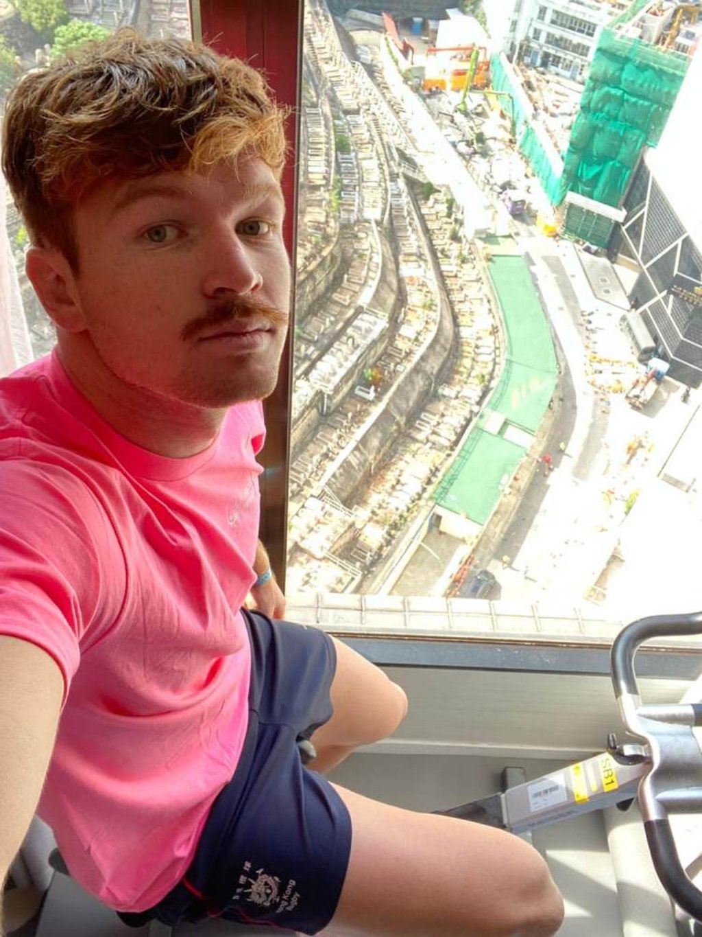 Liam Herbert from quarantine in Wan Chai while working out for Movember. Photo: Handout Liam Herbert from quarantine in Wan Chai while working out for Movember. Photo: Handout