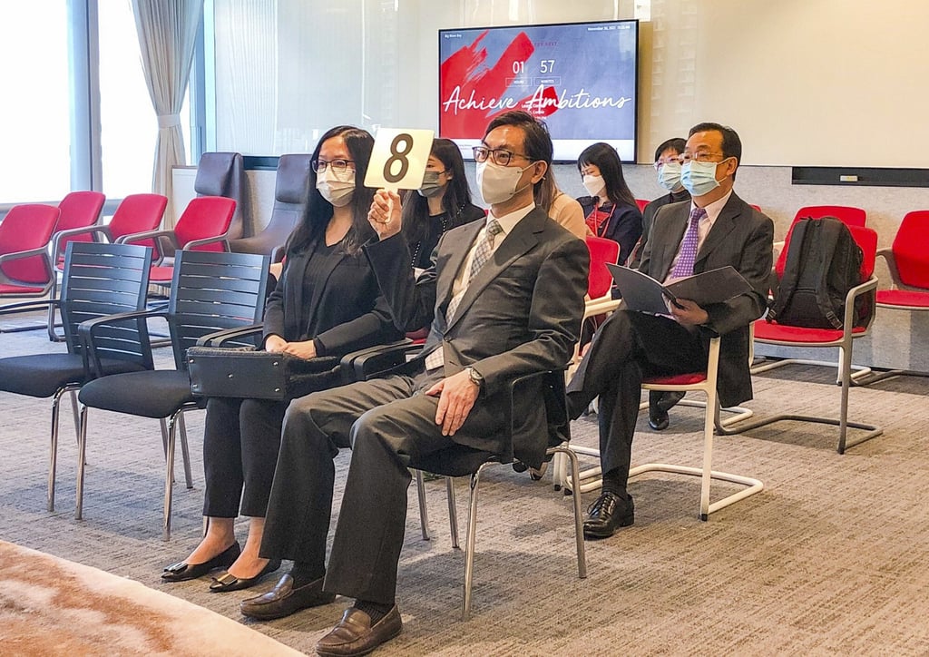 Augustine Wong Ho-ming, executive director of Henderson Land, attends the compulsory auction organised by JLL on Tuesday. Photo: Handout