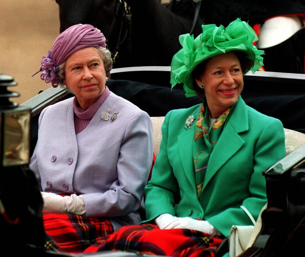 Queen Elizabeth and her younger sister, Princess Margaret, arrive by carriage at Horseguards Parade, London, in 1993 file photo. Photo: AP Photo/PA Queen Elizabeth and her younger sister, Princess Margaret, arrive by carriage at Horseguards Parade, London, in 1993 file photo. Photo: AP Photo/PA